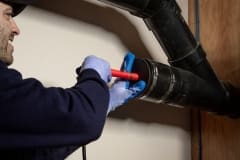 Contractor Installing Retro-DWS Internal Self-Regulating Tubular Heat Trace Cable System into Pipe