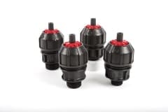 Four Red and Black Philmac Fittings