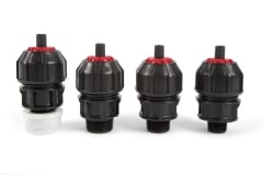 Four Red and Black Philmac Fittings