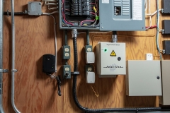 SURGE-BLOK indoors on electrical wall under electrical panel