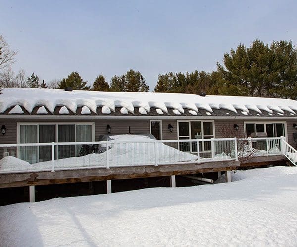 Roof heating cable system on roof in winter